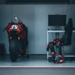 An empty pit box in the Honda HRC Castrol garage, signifying the absence of one of their riders.